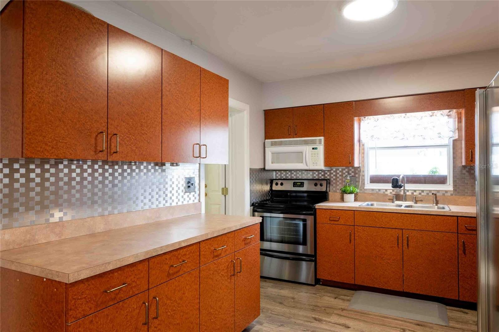 Door on the left leads to the third bedroom/in-law suite.