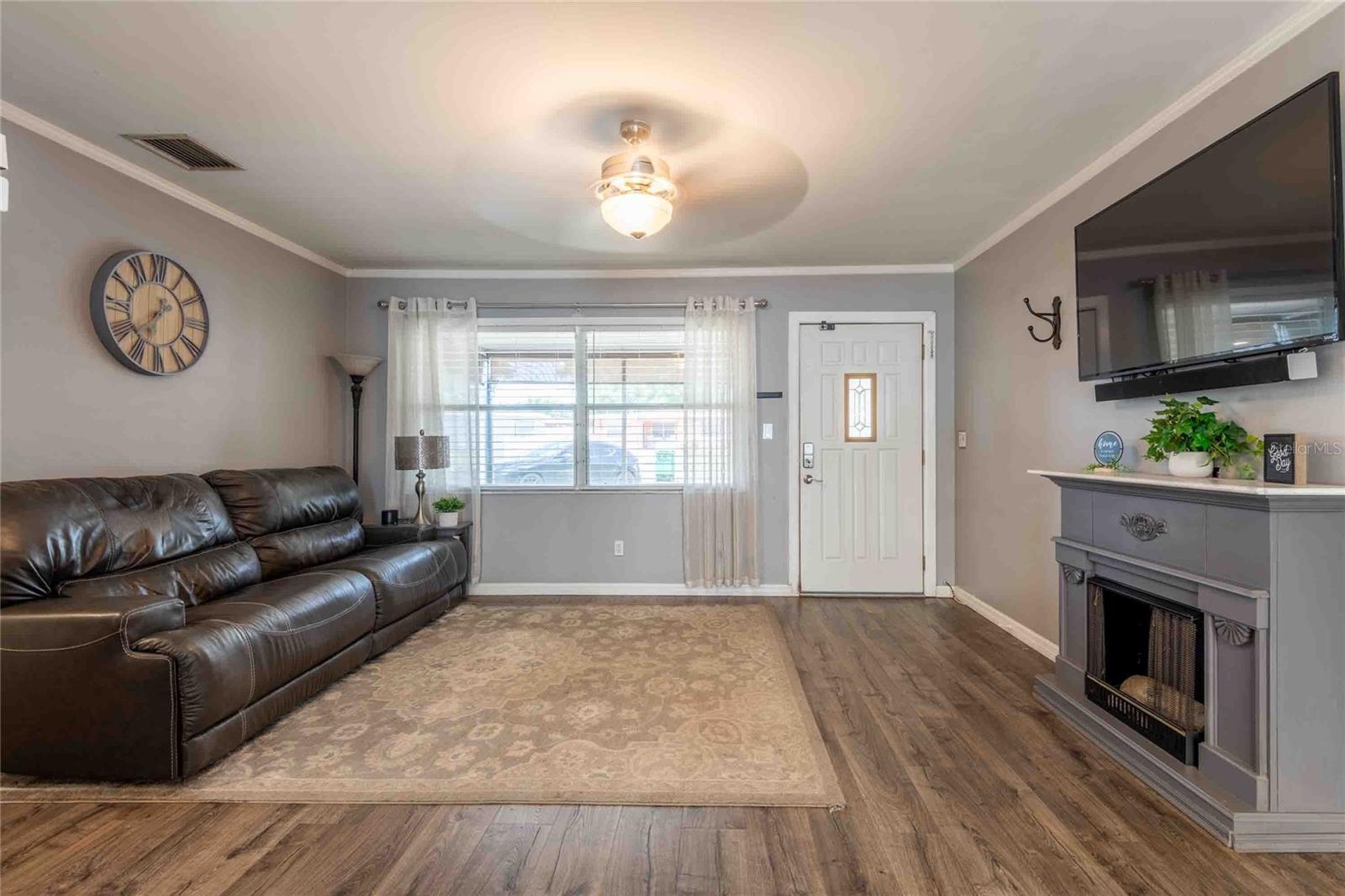 Great room and the fireplace conveys.