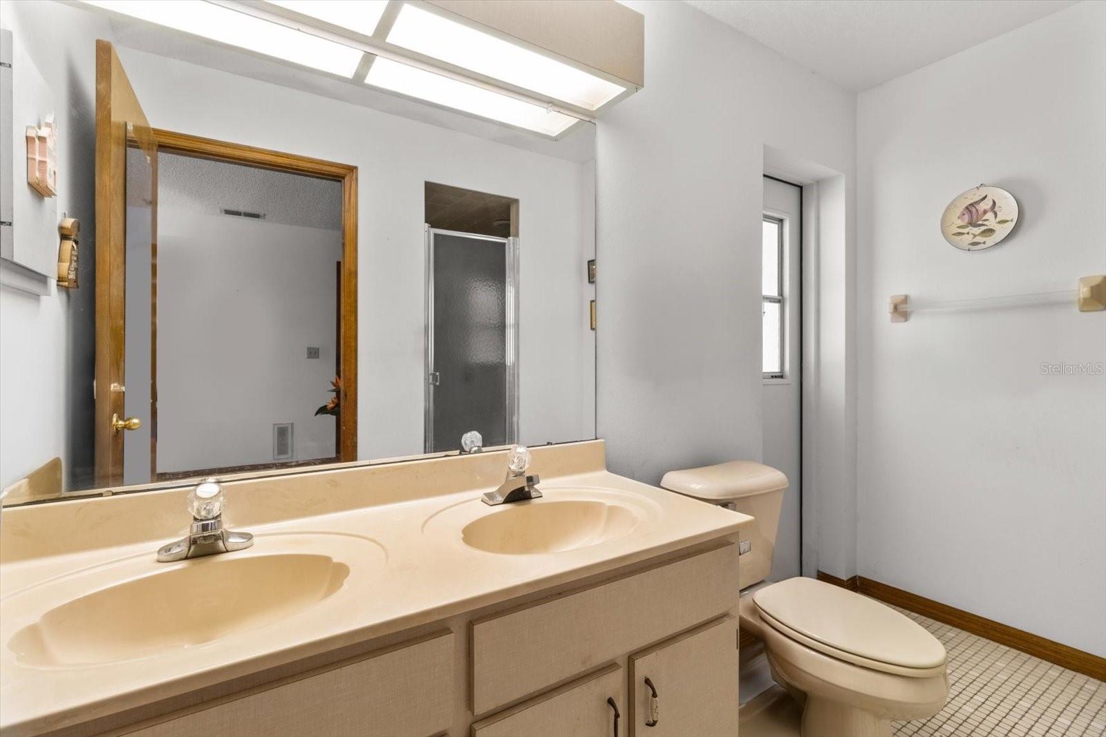 Primary bathroom with double vanities