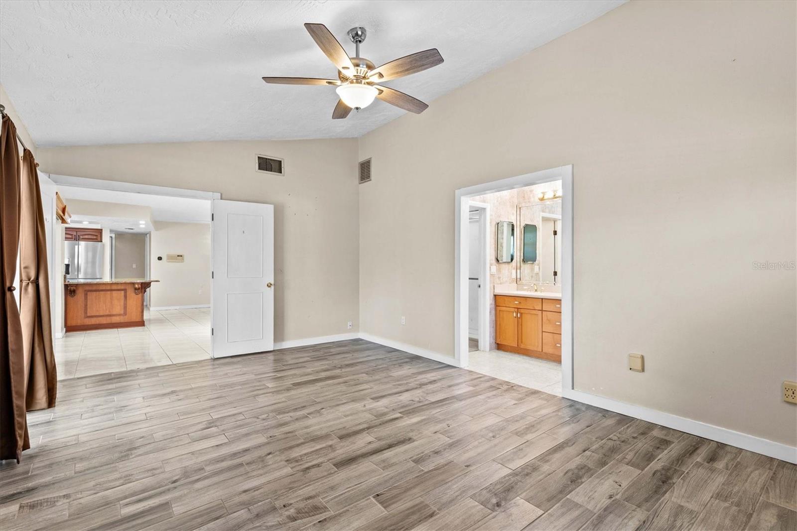 Primary suite with double door entry adds privacy and presence