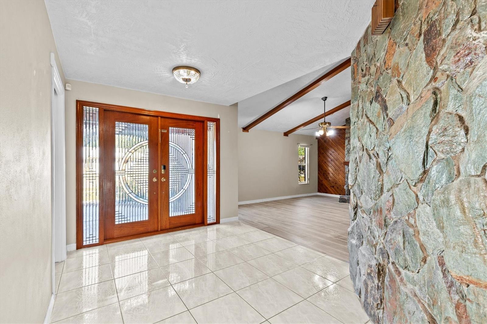 Double door entry offers a spacious, inviting entrance