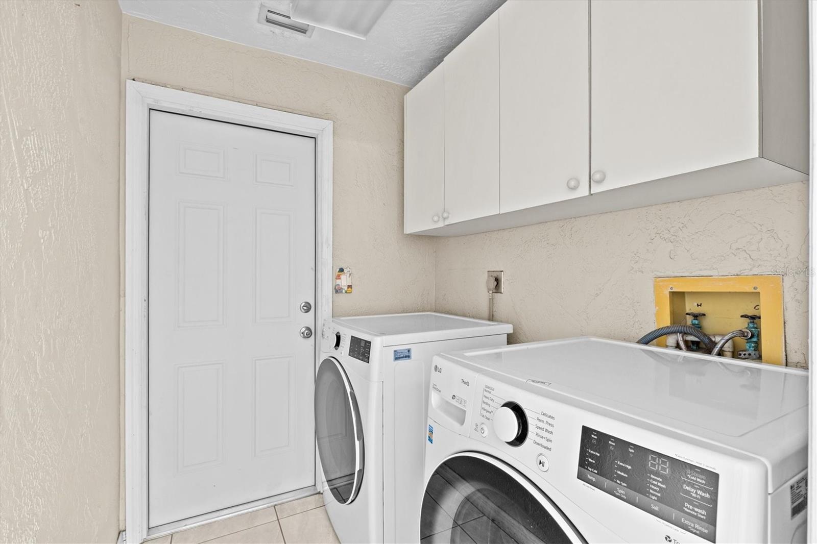 Laundry room with storage