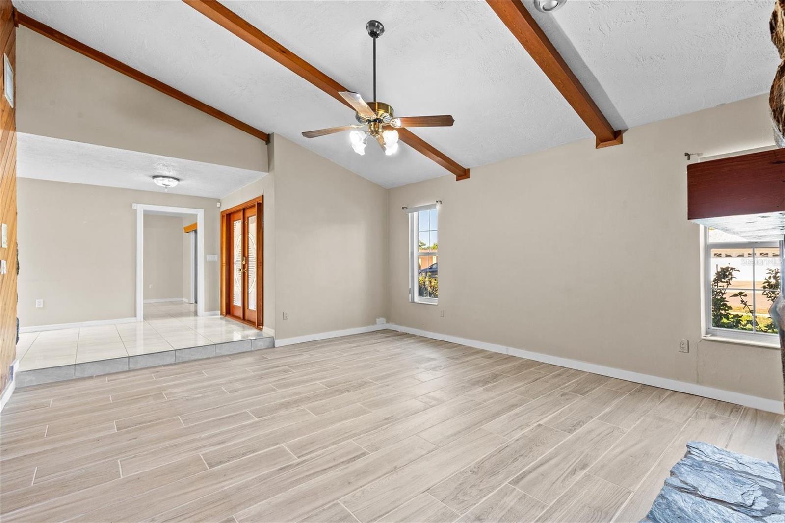 Vaulted ceilings create a bright, spacious living area.