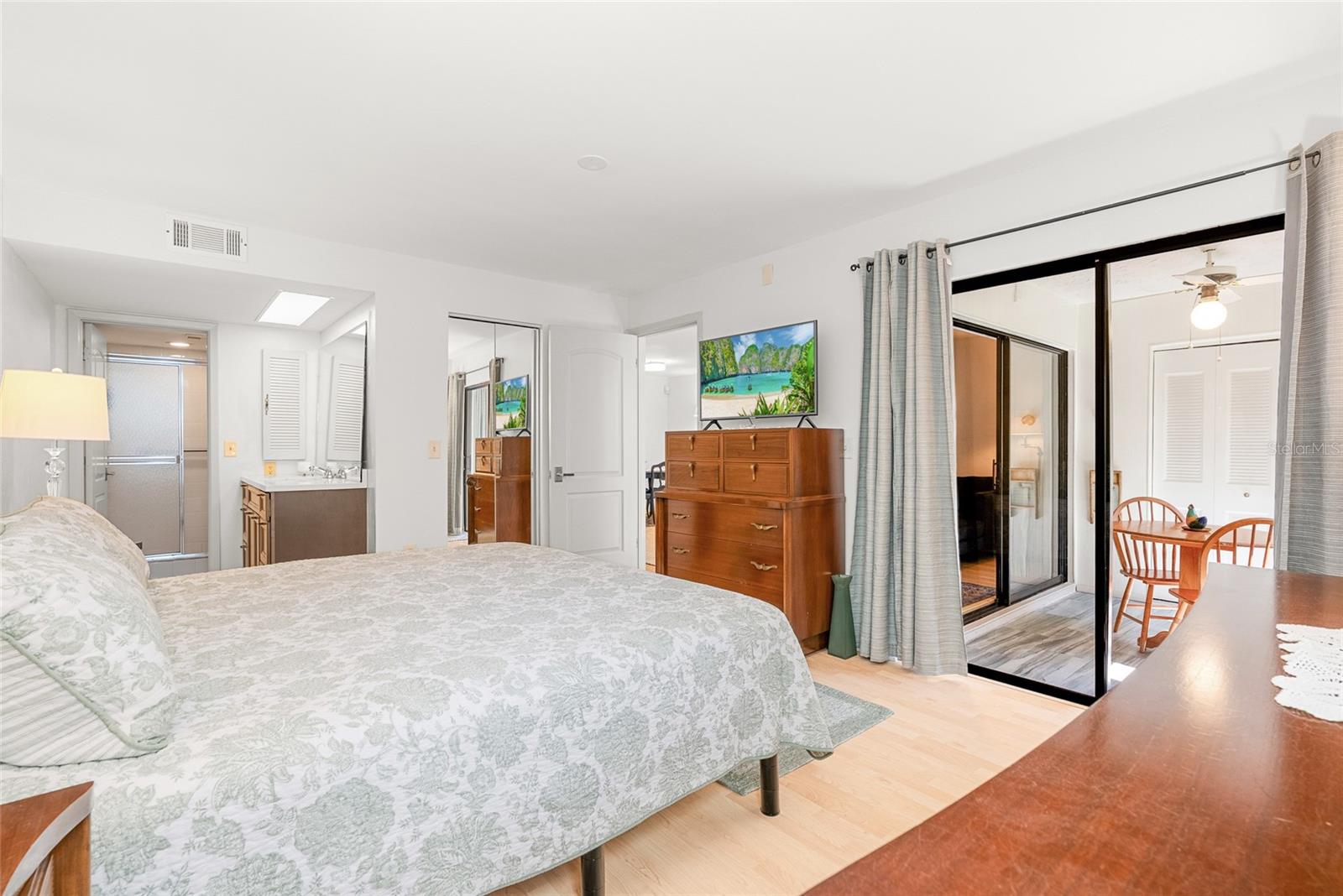 Primary Bedroom with Sliders to Patio