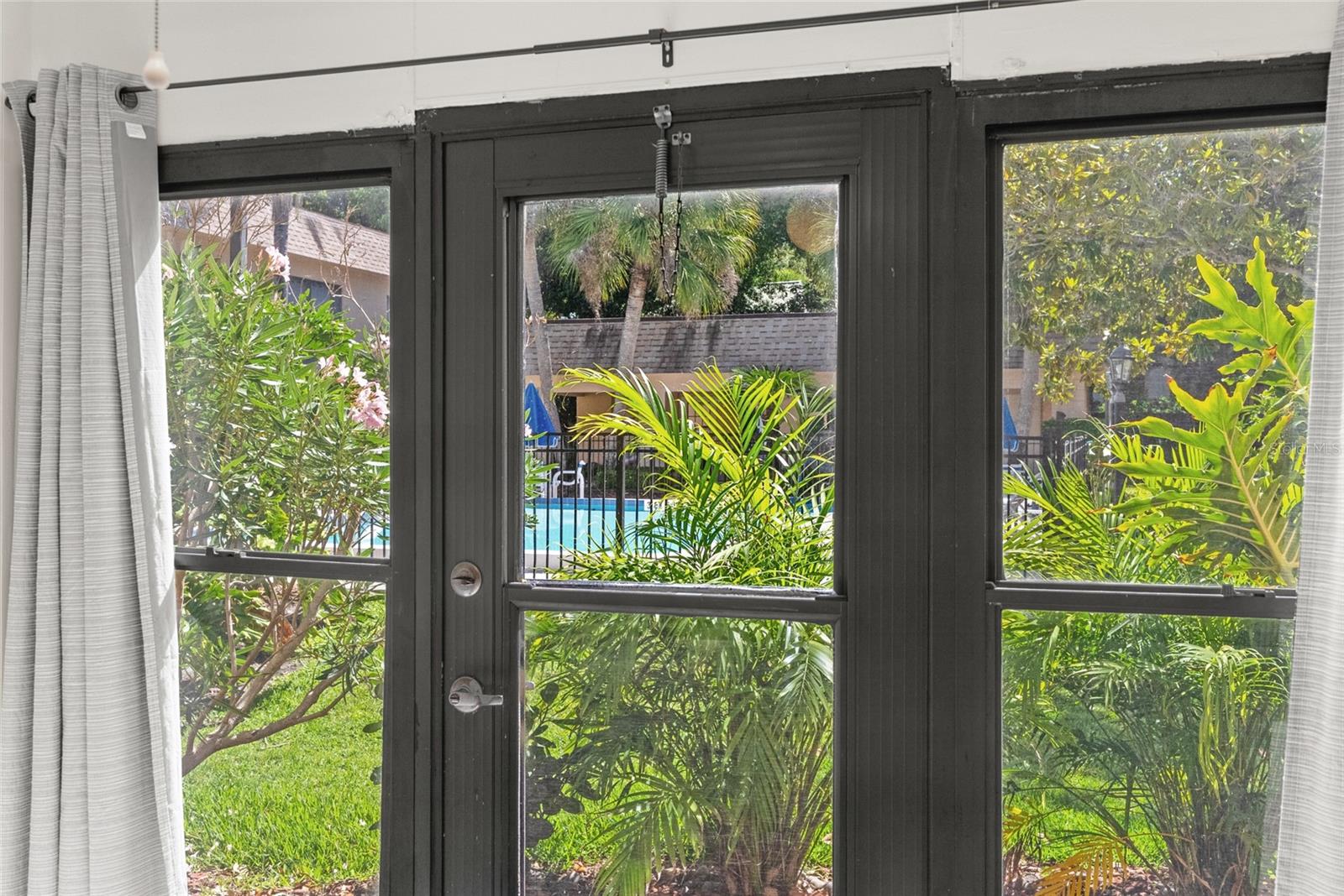 Back Patio Door to the Pool and Side Gate