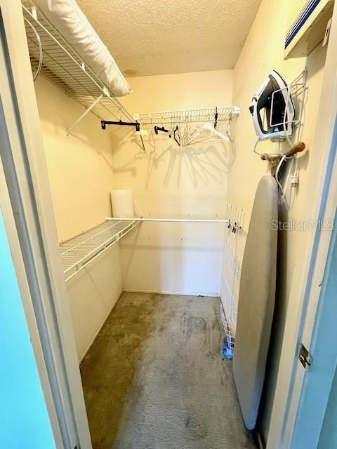 Large primary bedroom walk-in closet.
