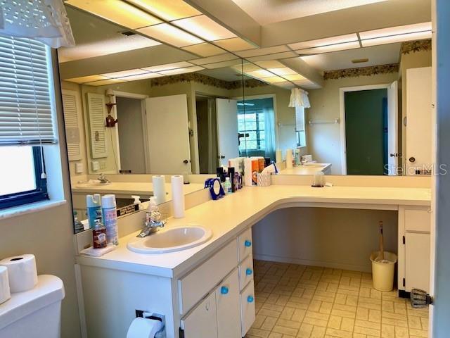 Primary En-Suite bathroom with two sinks and tub/shower combination.