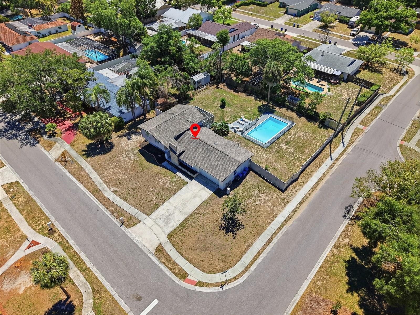 Large oversized corner lot w/ heated pool