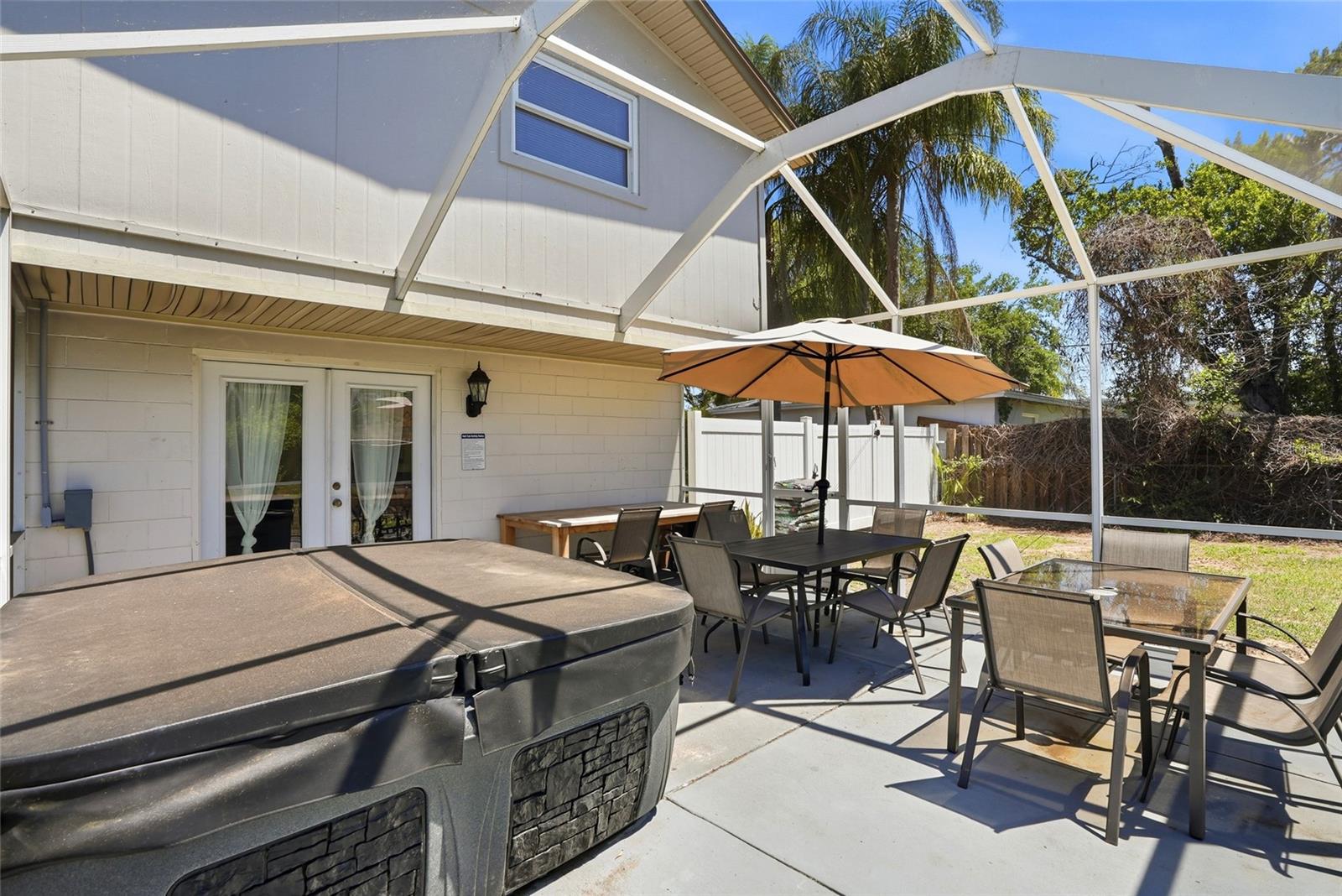 Patio w/ hot tub and patio furniture