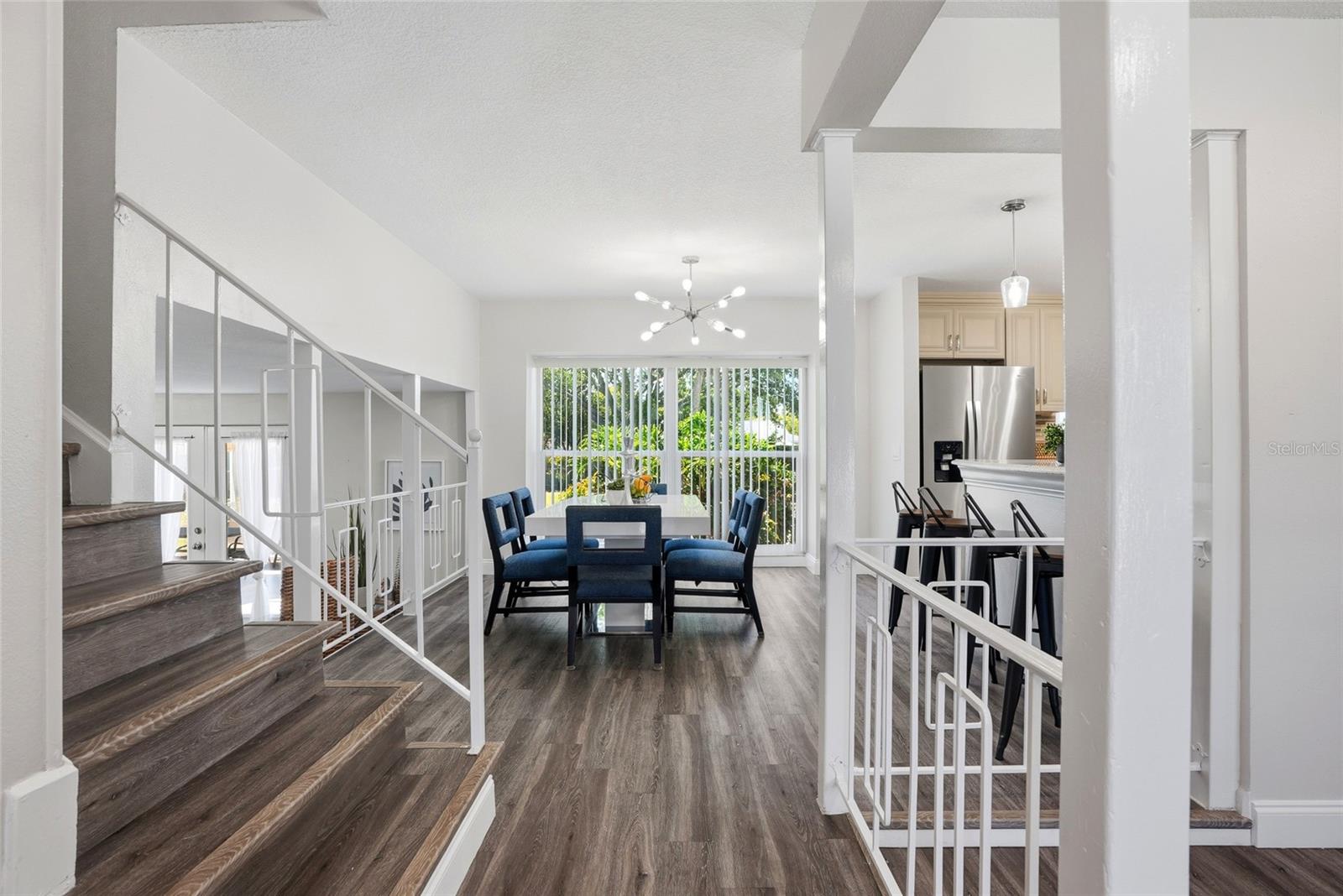 Entrance leads to upstairs on left