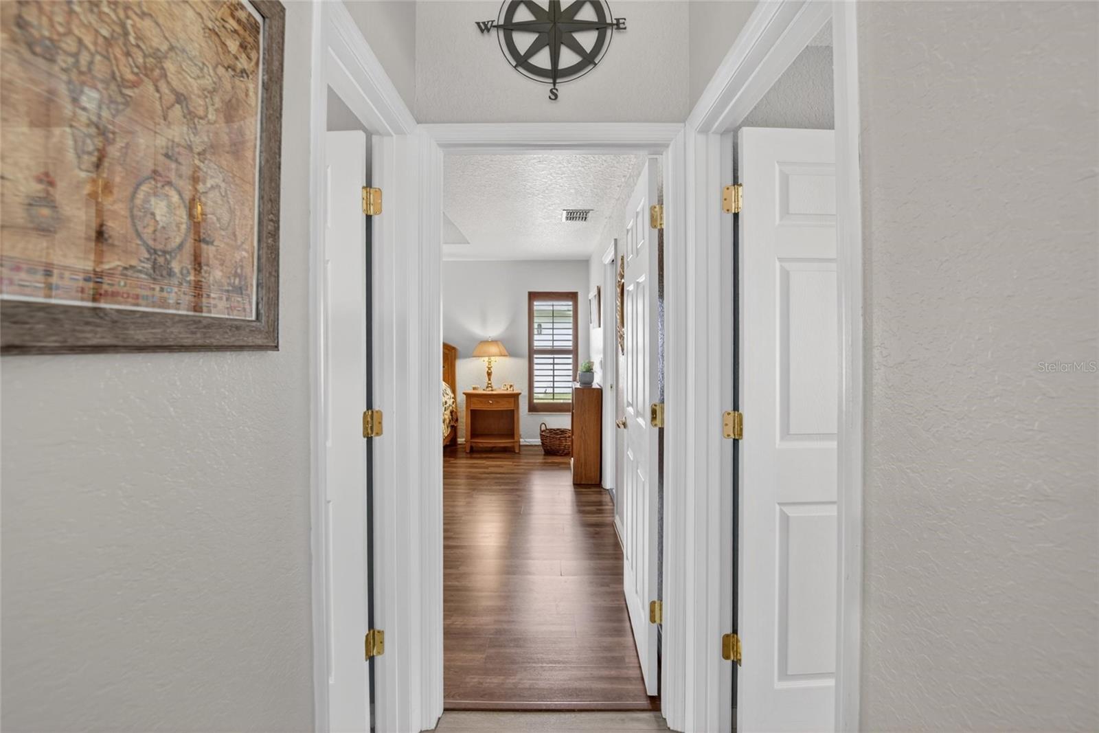 Hall access to Primary , Pool Bathroom and Guest Bedrrom