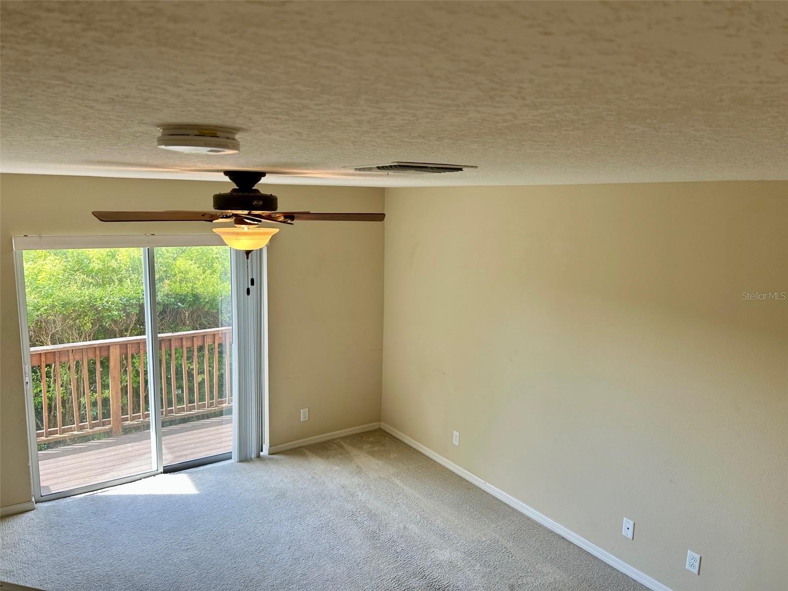 Great Room With Sliders To Deck