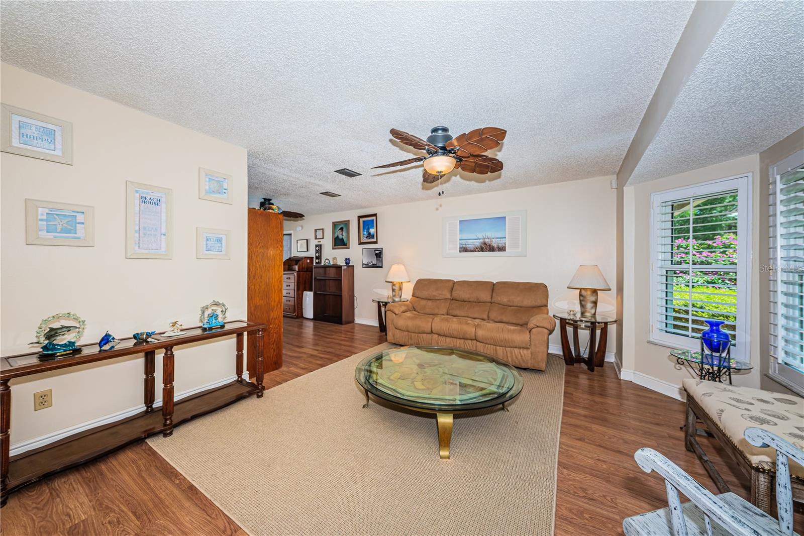 Formal living room with newer windows.