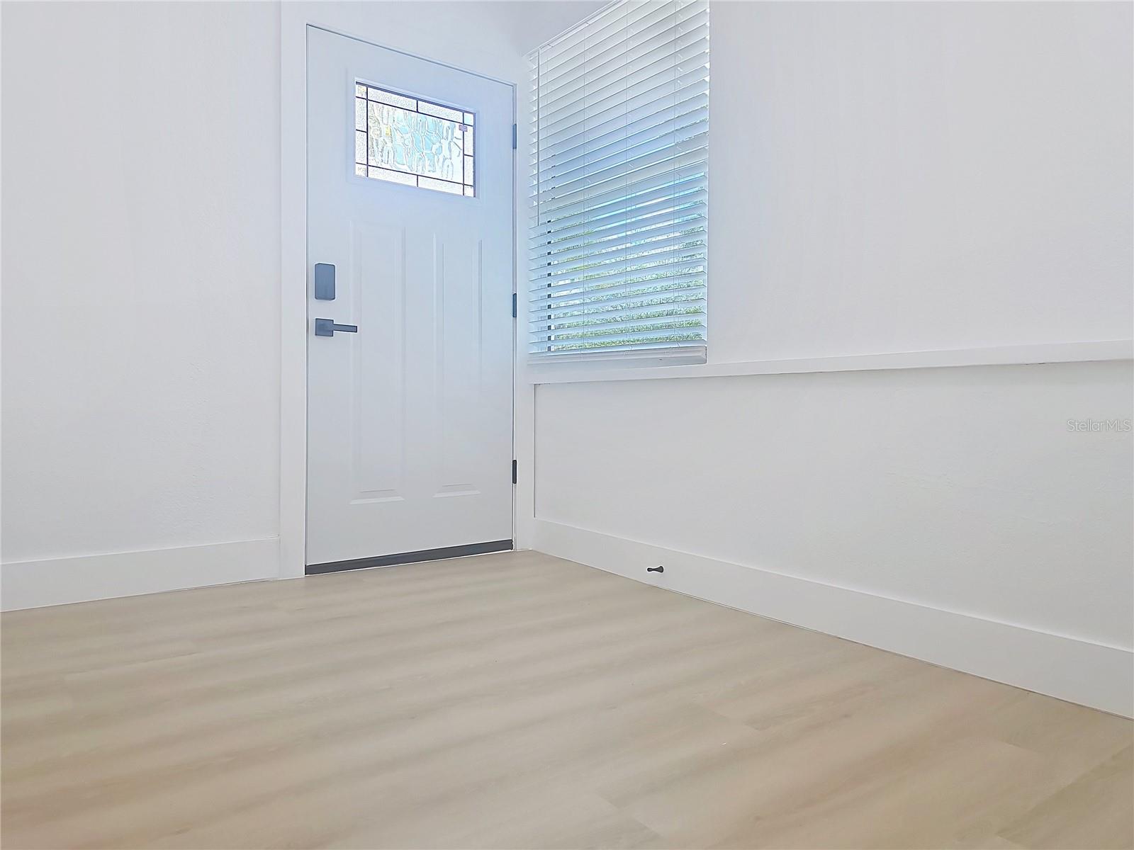 FRONT DOOR / FOYER-DEN AREA