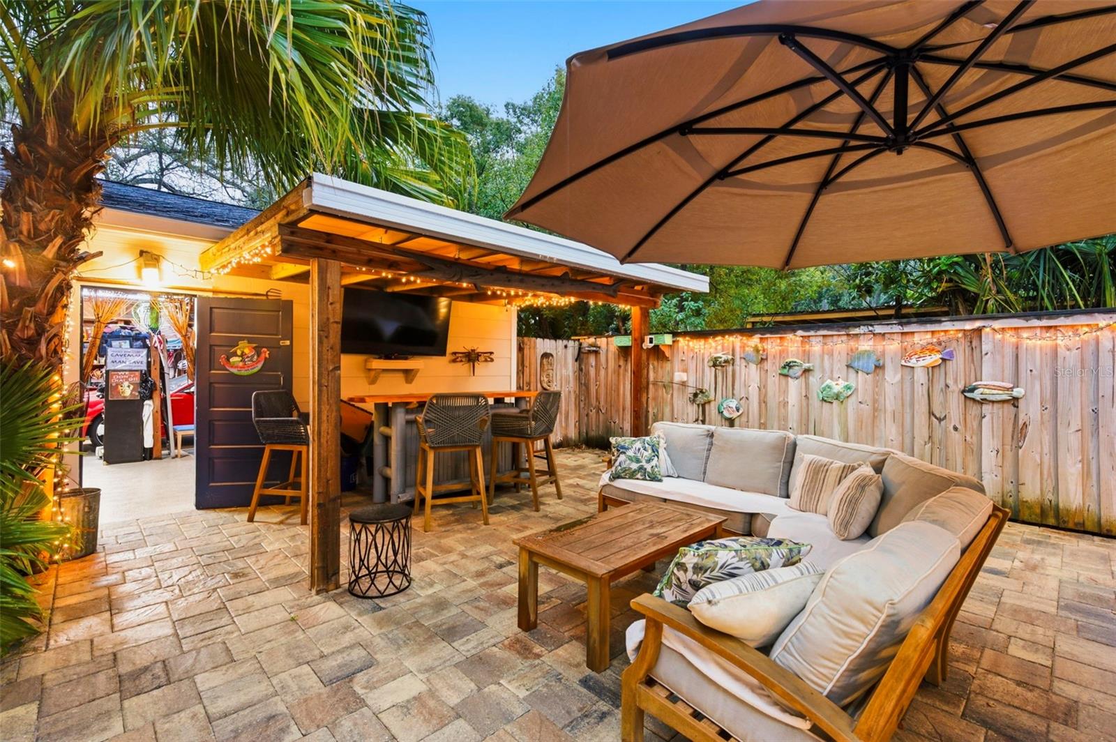 Back Patio with bar and garage access