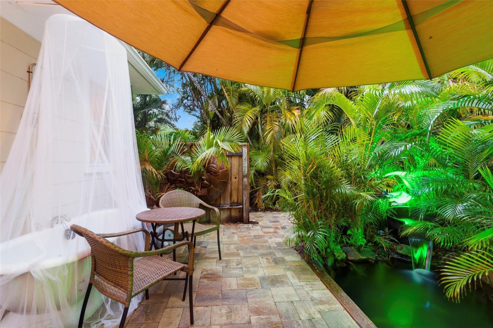Back Patio with Koi Pond and Soaking Tub