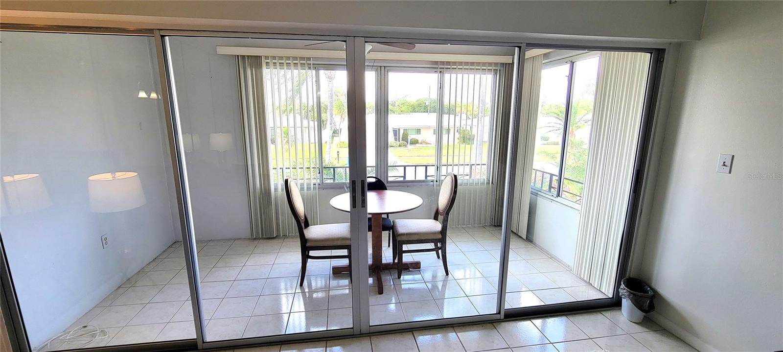 Enclosed Balcony - The windows can be opened and then the sliding doors shut to close it off, or the doors can be open to enlarge the living area.