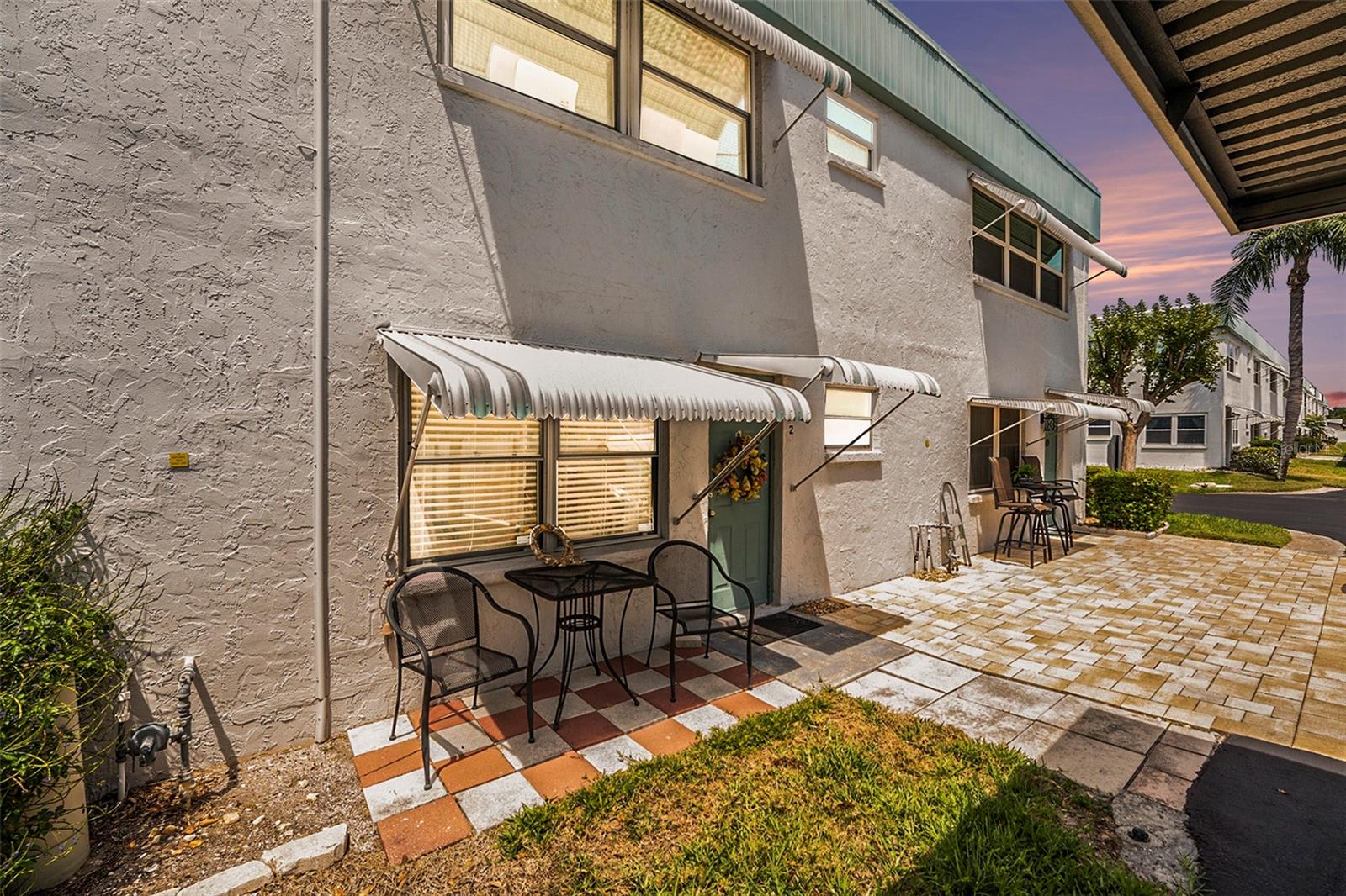 Rear entrance next to parkig space