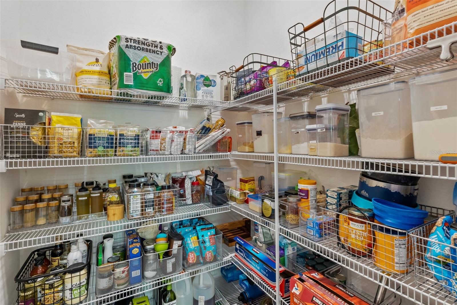 Large pantry provides plenty of additional kitchen storage.