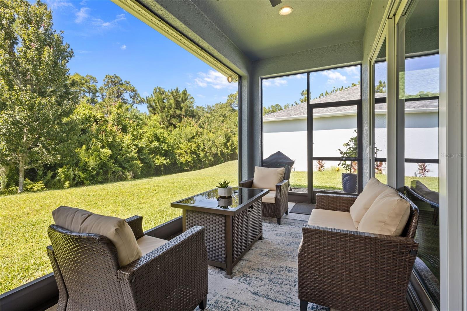 Covered lanai extends the living space outdoors.