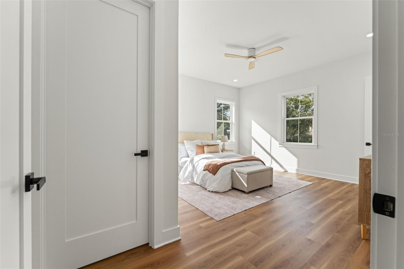 Primary bedroom with dual closets