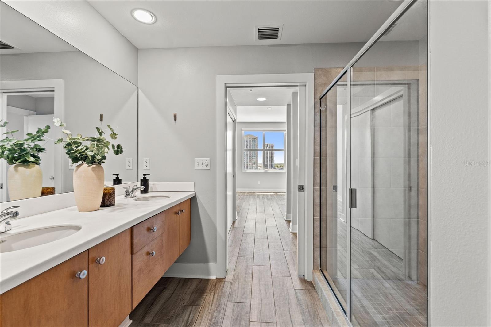 Primary bath with walk in shower and dual sinks