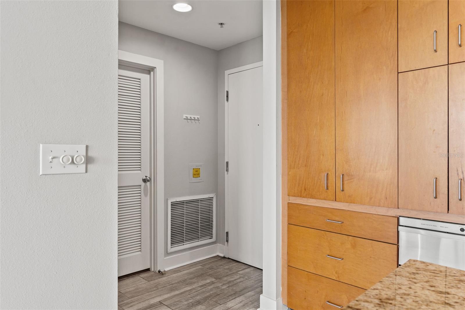 entry way and door to laundry room