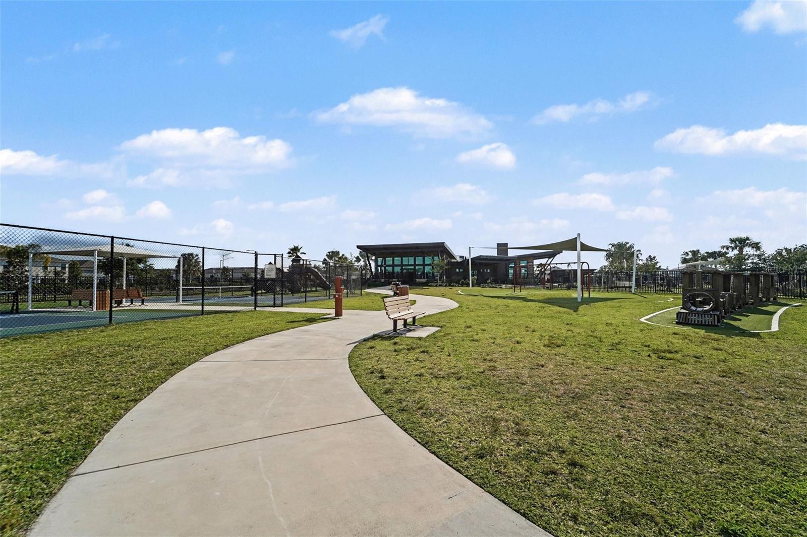 2 Pickleball couts and playground.