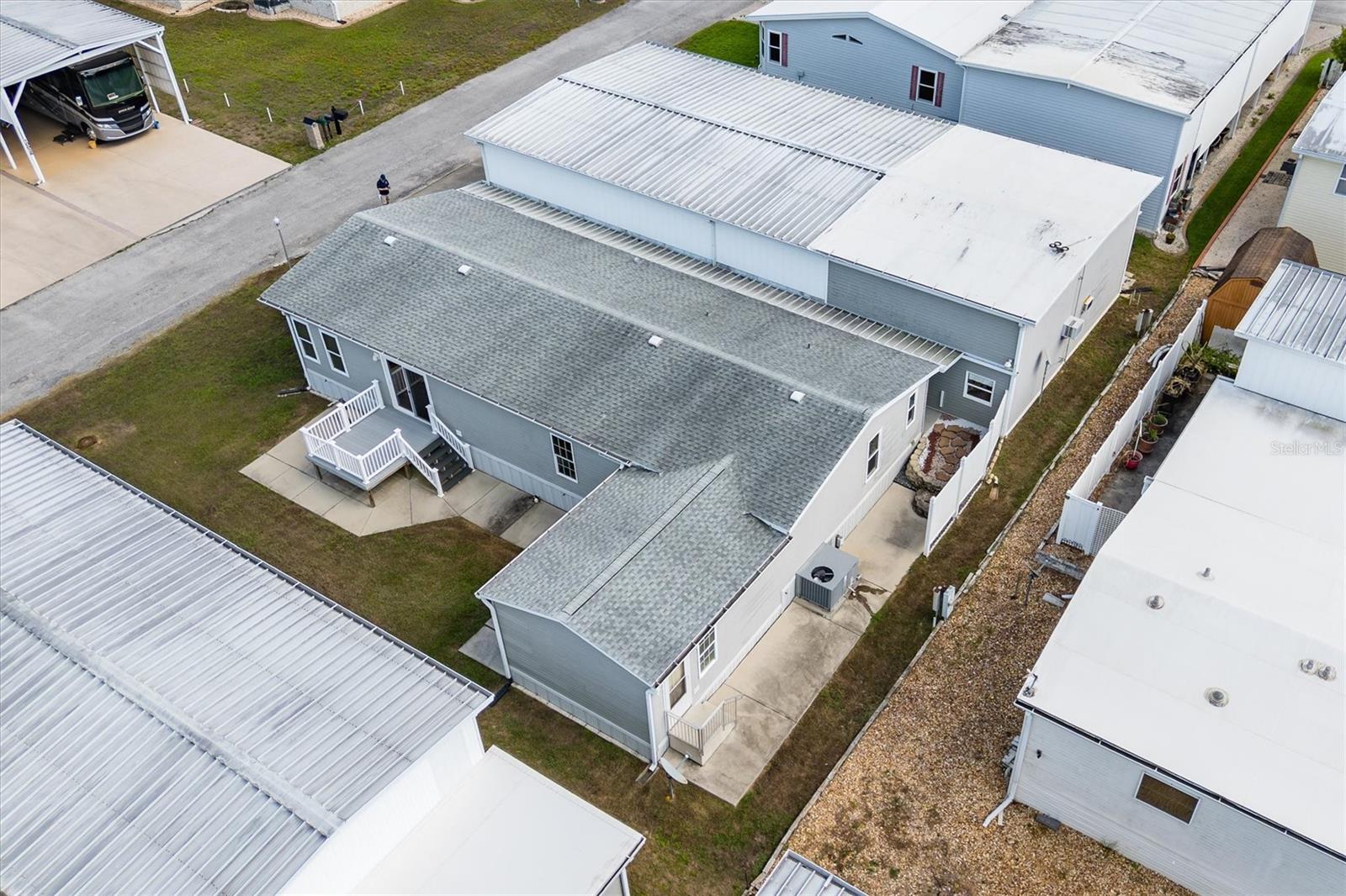 Another view of rear of the property with nice space between neighbors