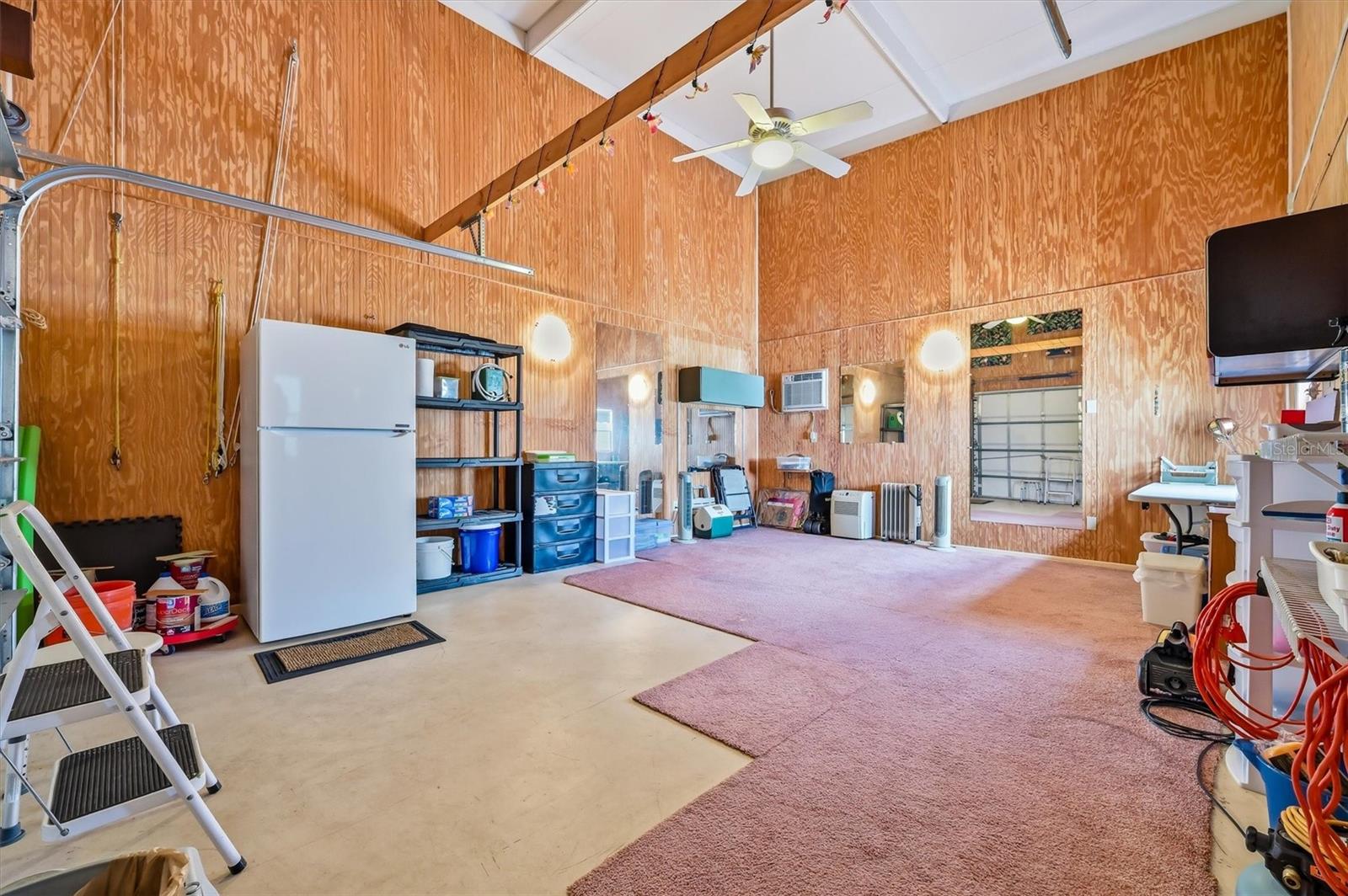 Garage space .  Refrigerator can stay.