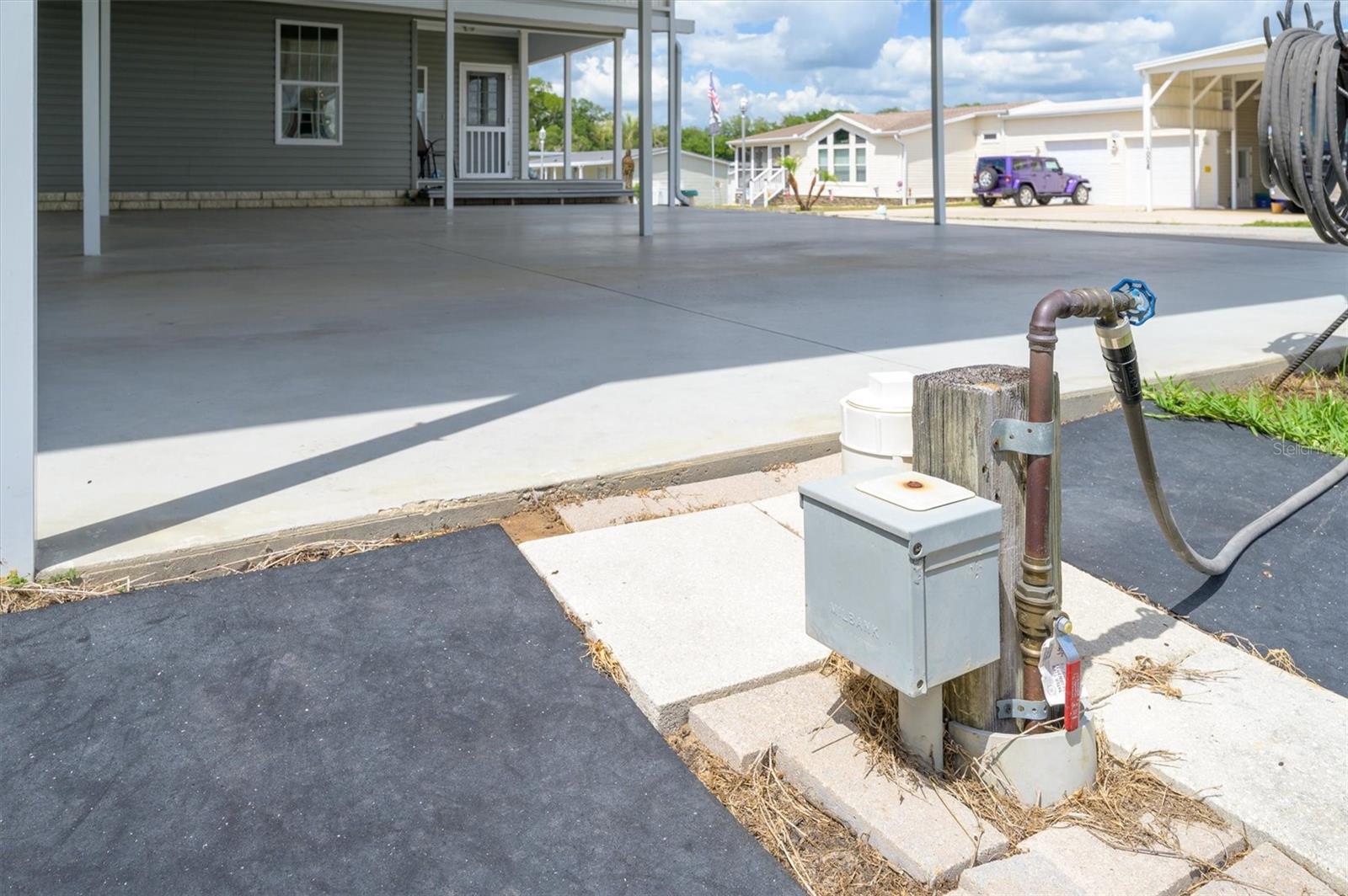 Here is the 50 Amp electrical and pump station for the RV port for hoodups.  This hooks to community sewer system.