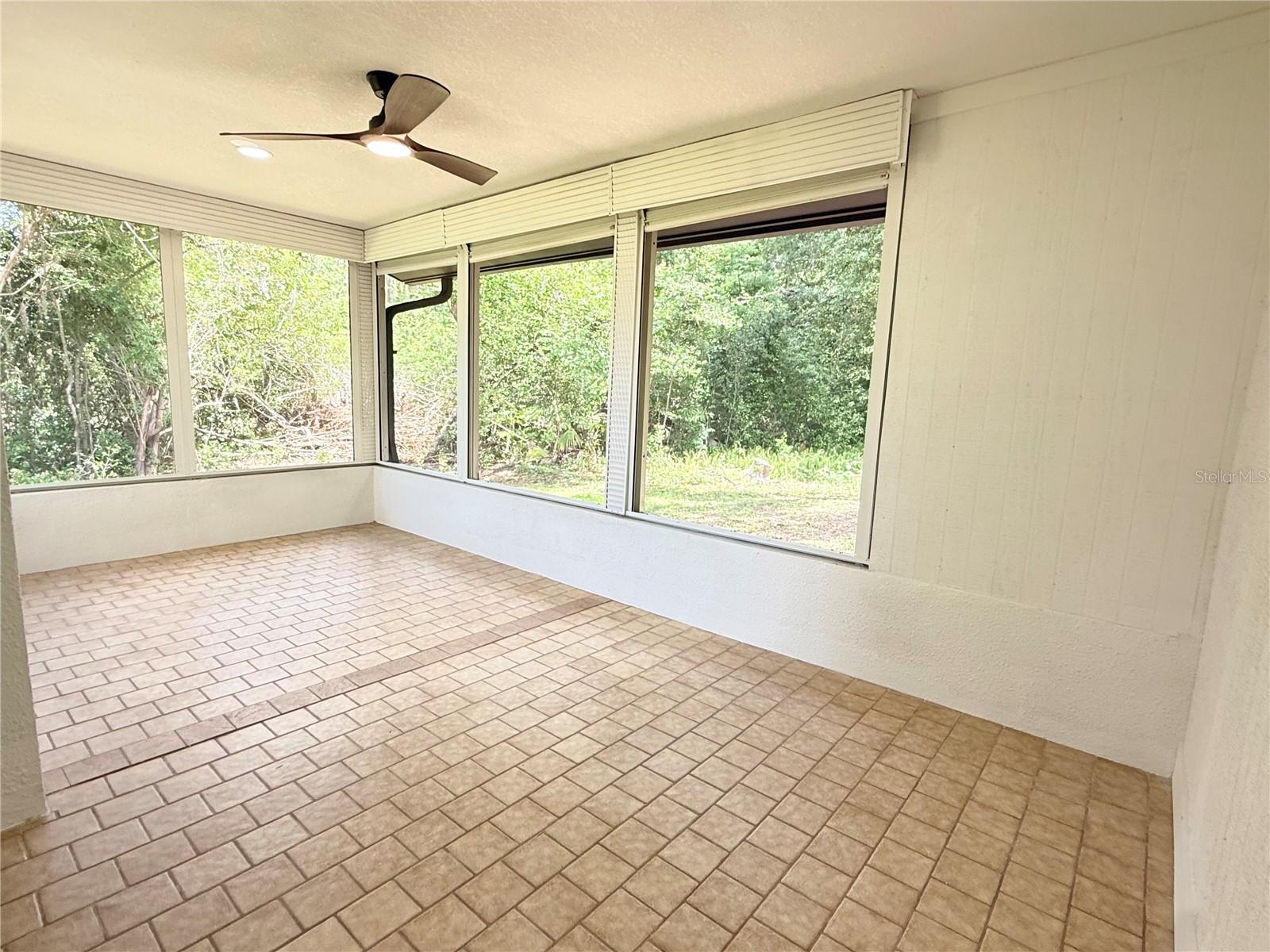 Screened Porch with Storm Rollers
