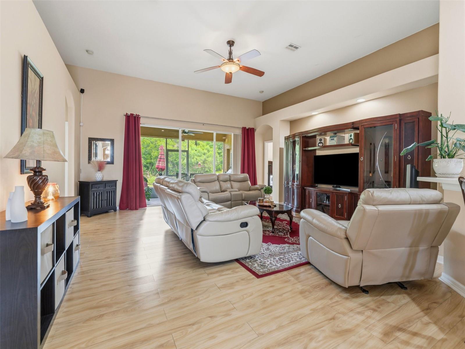 High ceilings and 8ft sliders to lovely screened porch with conservation views