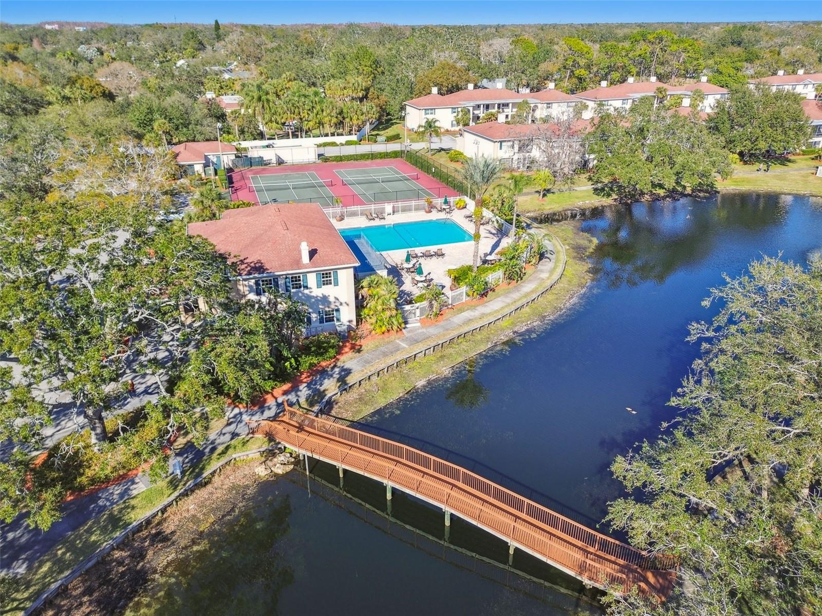 Beautiful walking paths and the club house with 2 pools, 2 tennis courts, & fitness center
