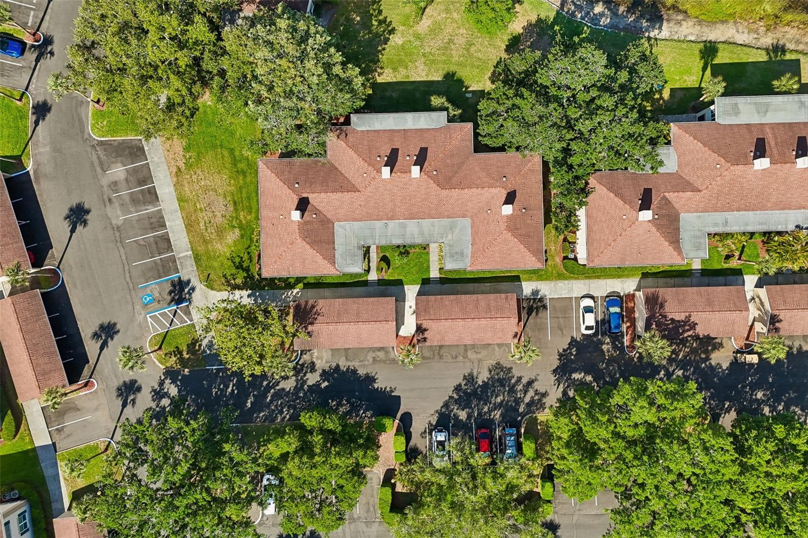 Arial view of condo and guest parking