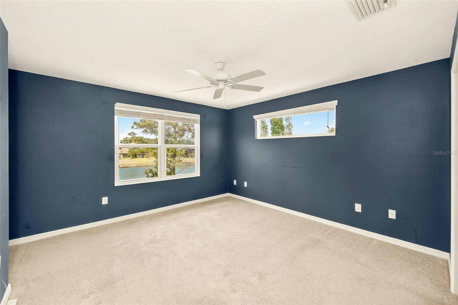 Primary Bedroom has gorgeous water views and amazing sunsets!