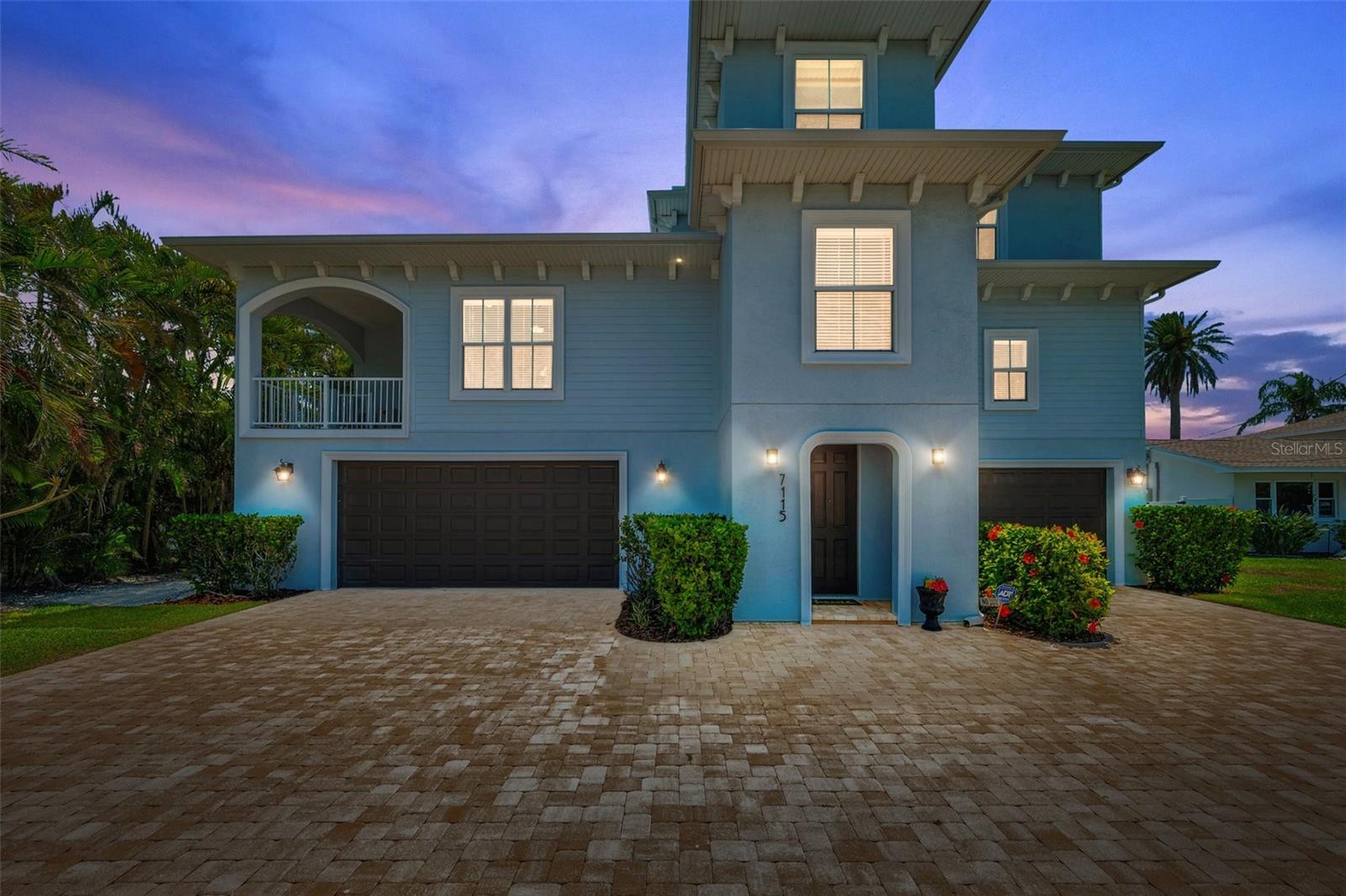 This quality 2018-built St Pete Beach waterfront estate has beautiful curb appeal in the front, and a dreamy wide open panoramic water view in the back. The lot is 10,502 square feet and includes 75' of waterfront.