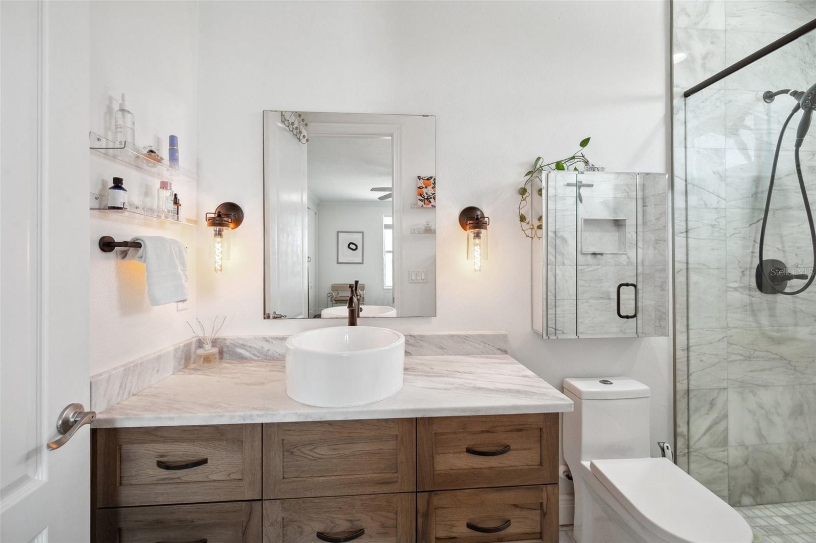 Marble bathroom of the 3rd floor bedroom suite.