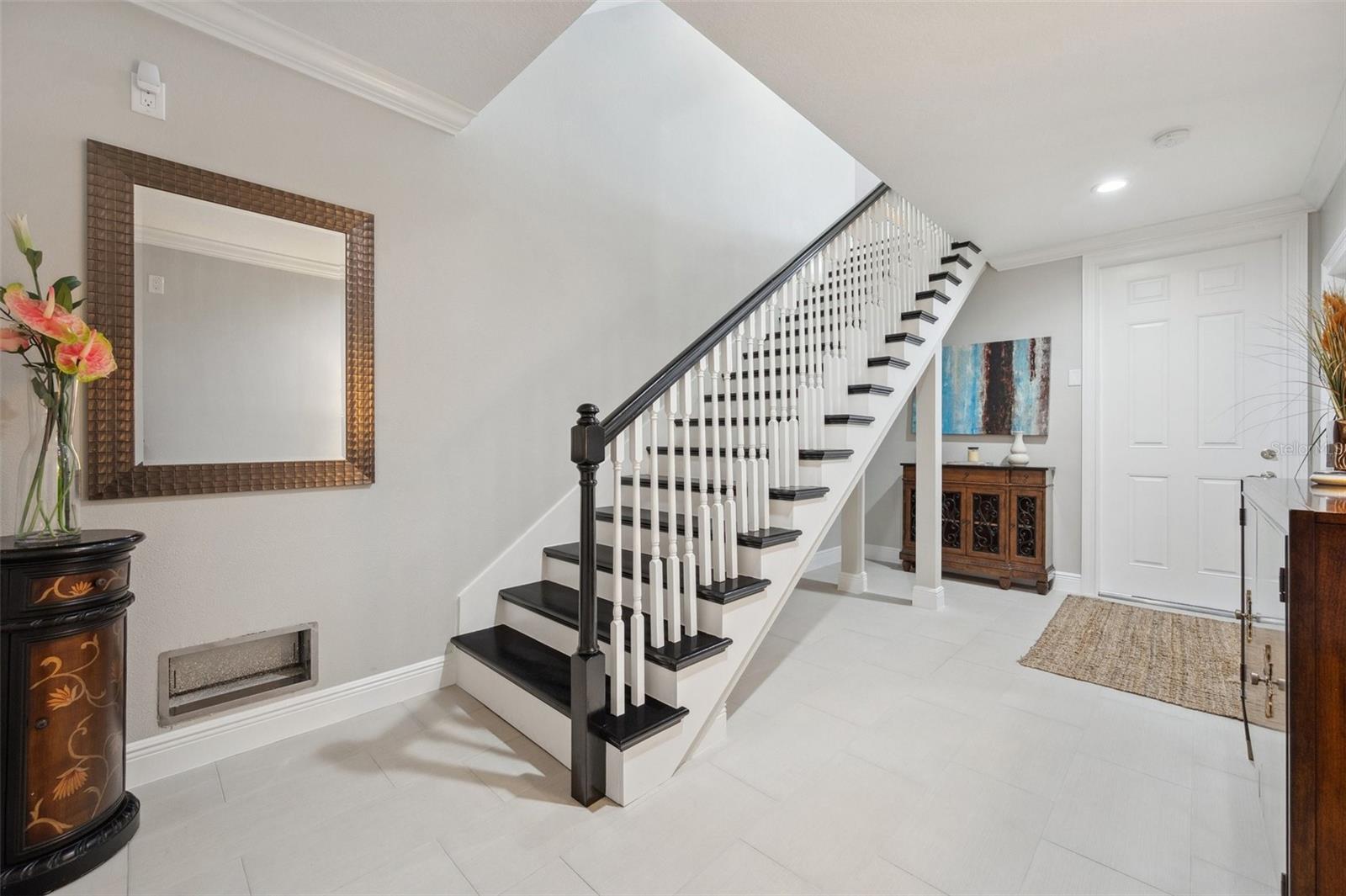 1st level entryway. Here you have access to the elevator, stairs, as well as an entry into the oversized 4-car garage.