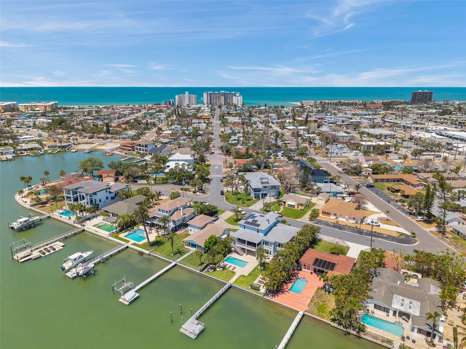 This St Pete Beach home offers the best of the intracoastal and the beach (a walk to the sand will take you about 15 minutes - just walk towards the blue water in the background.)