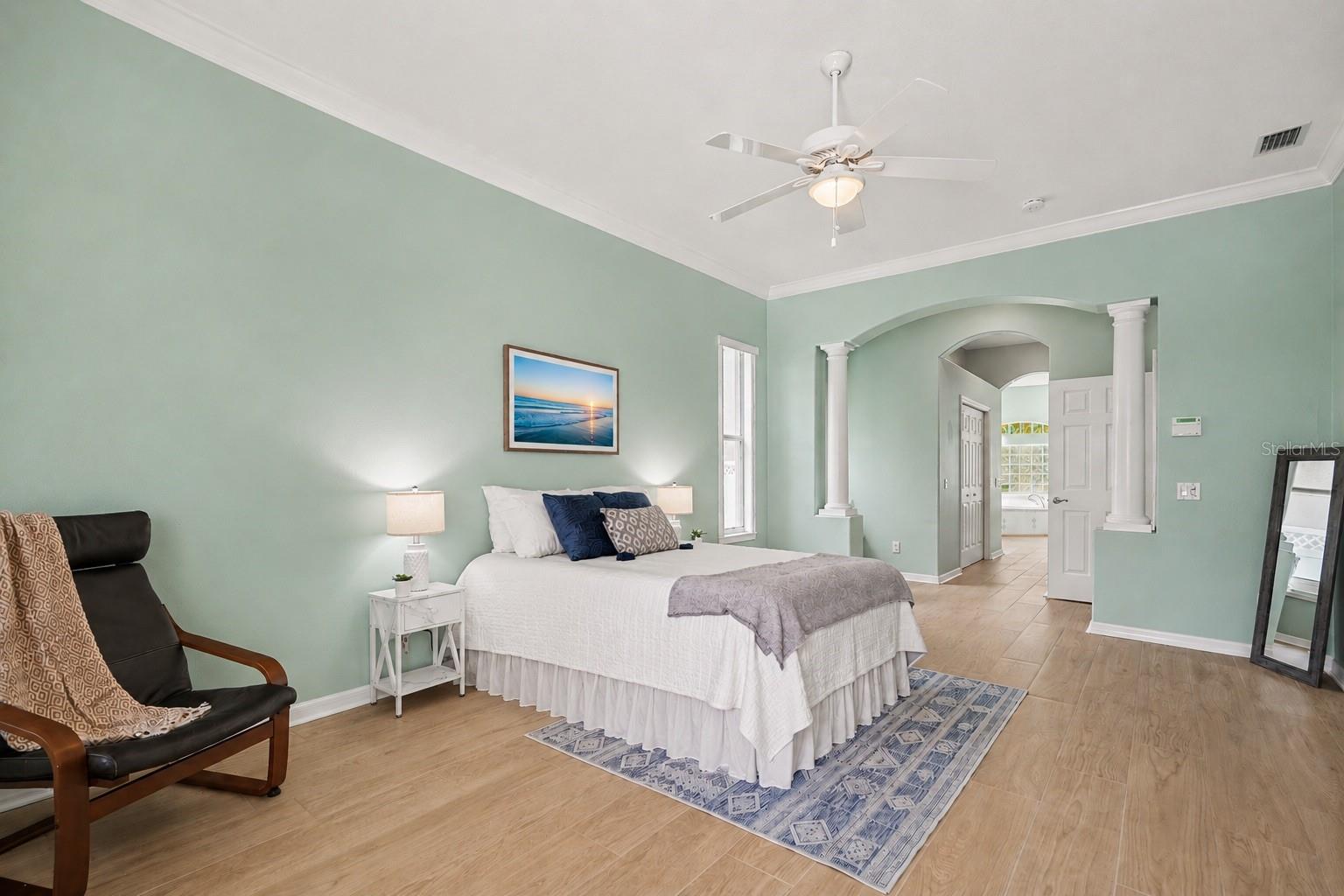 Primary bedroom with two walk in closets