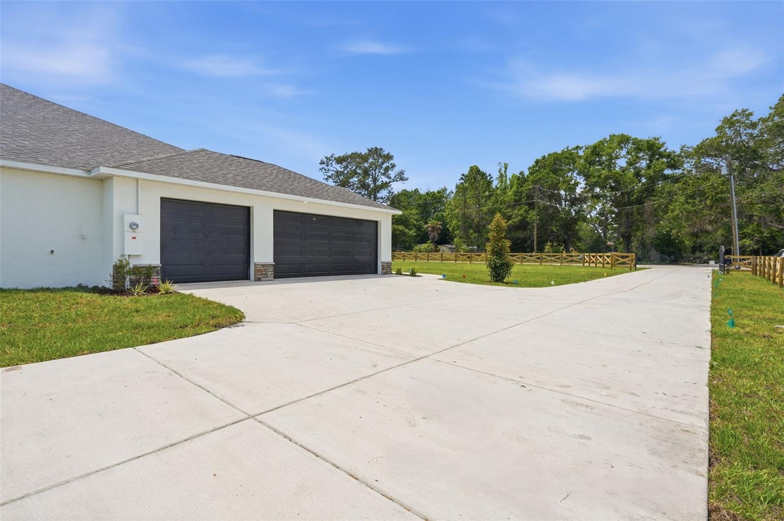 3 Car Garage with Oversized Parking Pad