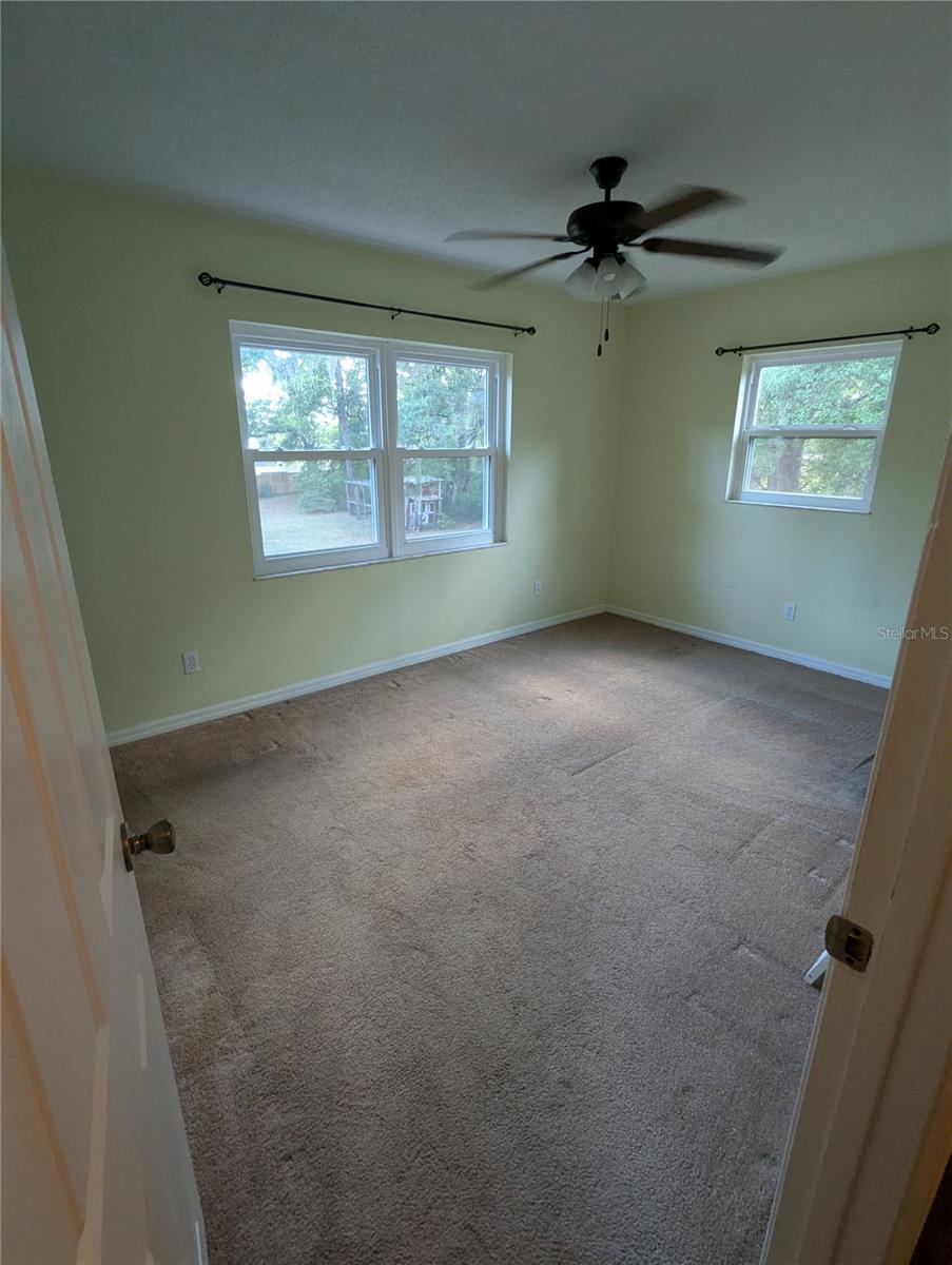 2nd bedroom overlooks the back yard.