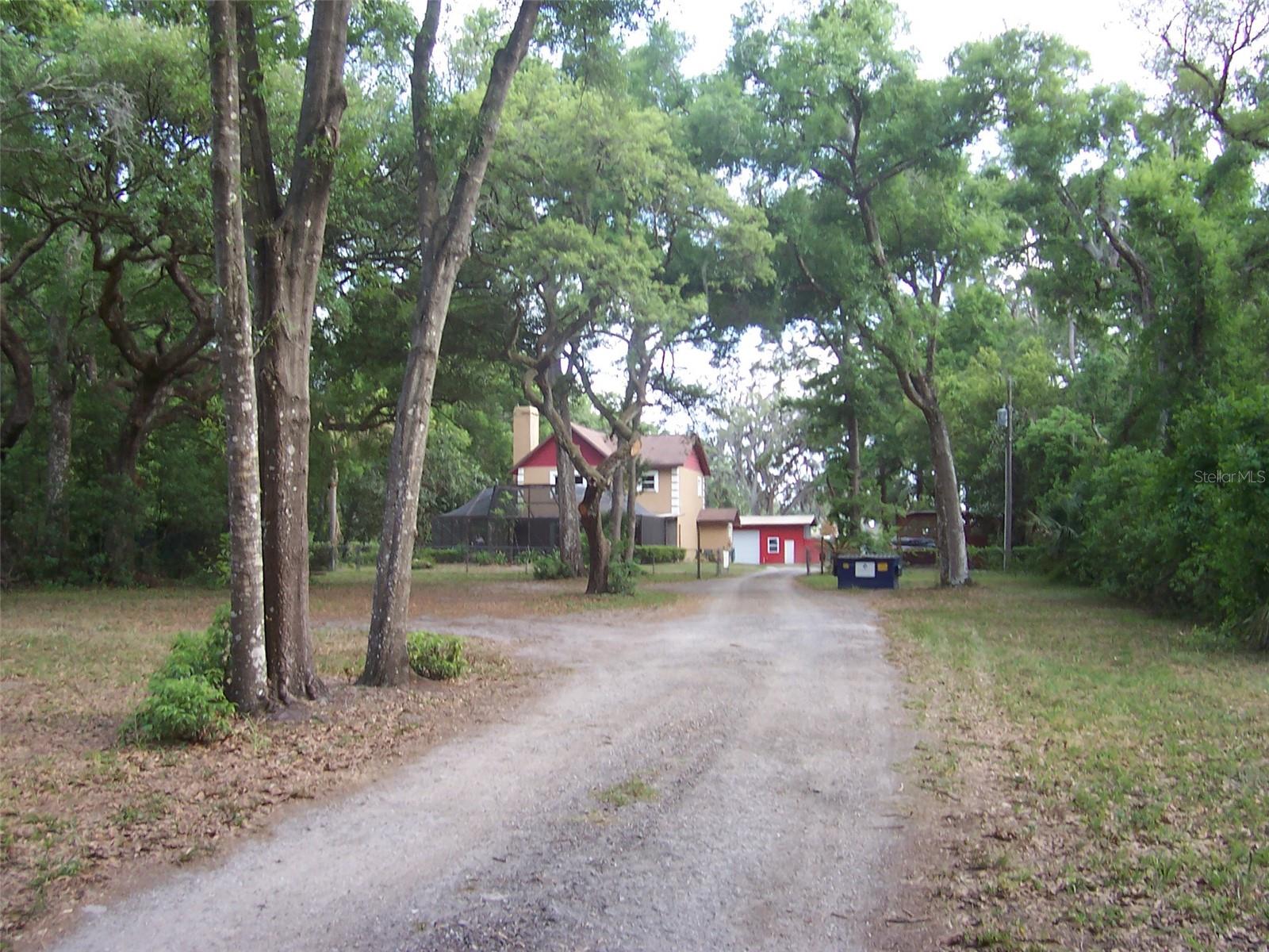 Beautiful Drive through the woods welcomes you to a peaceful retreat to call your own!