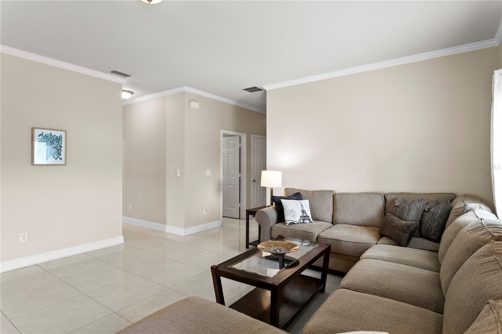 Split bedroom floor plan with 2nd and 3rd bedroom off the living room