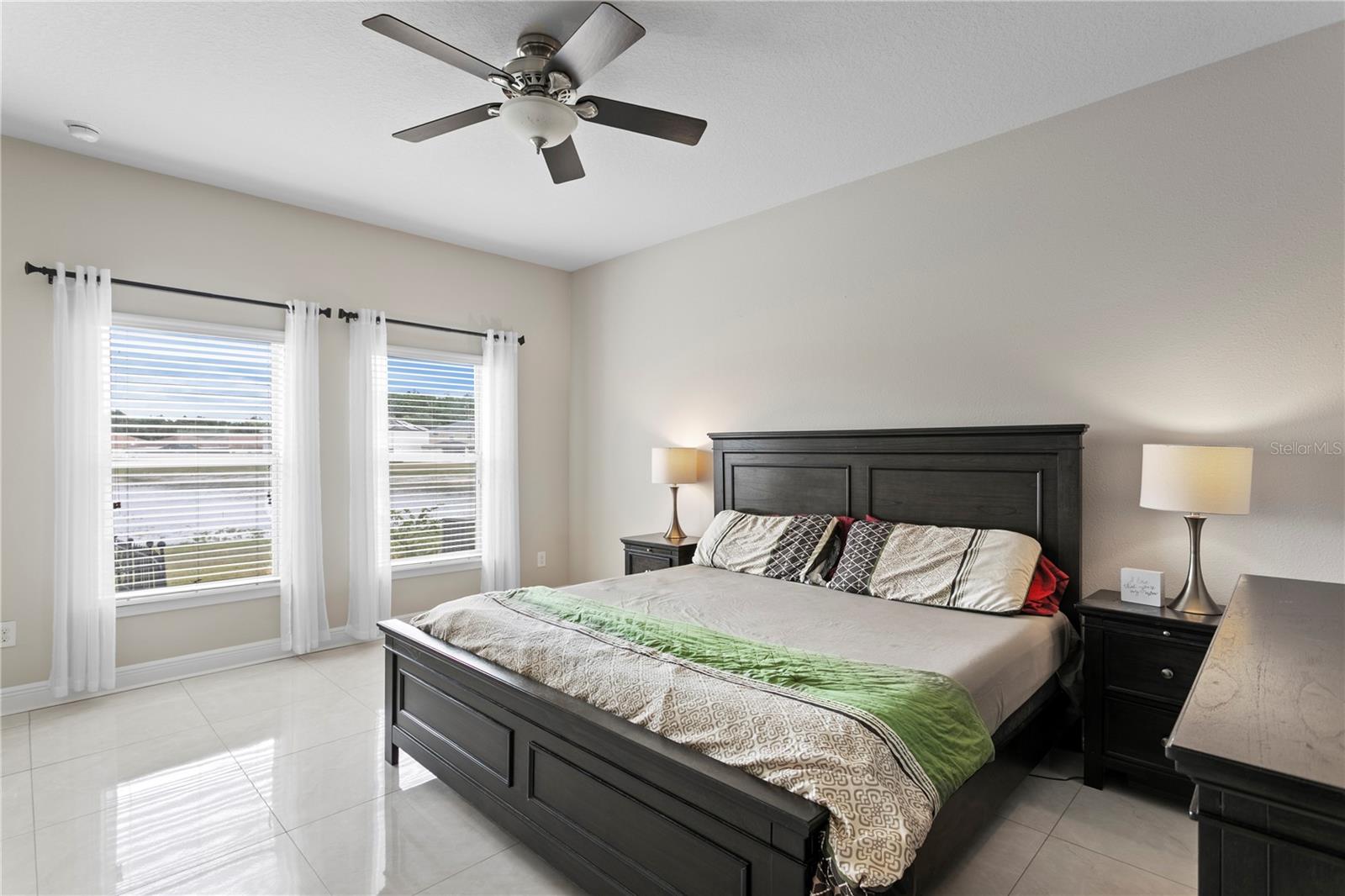 Primary suite with backyard views