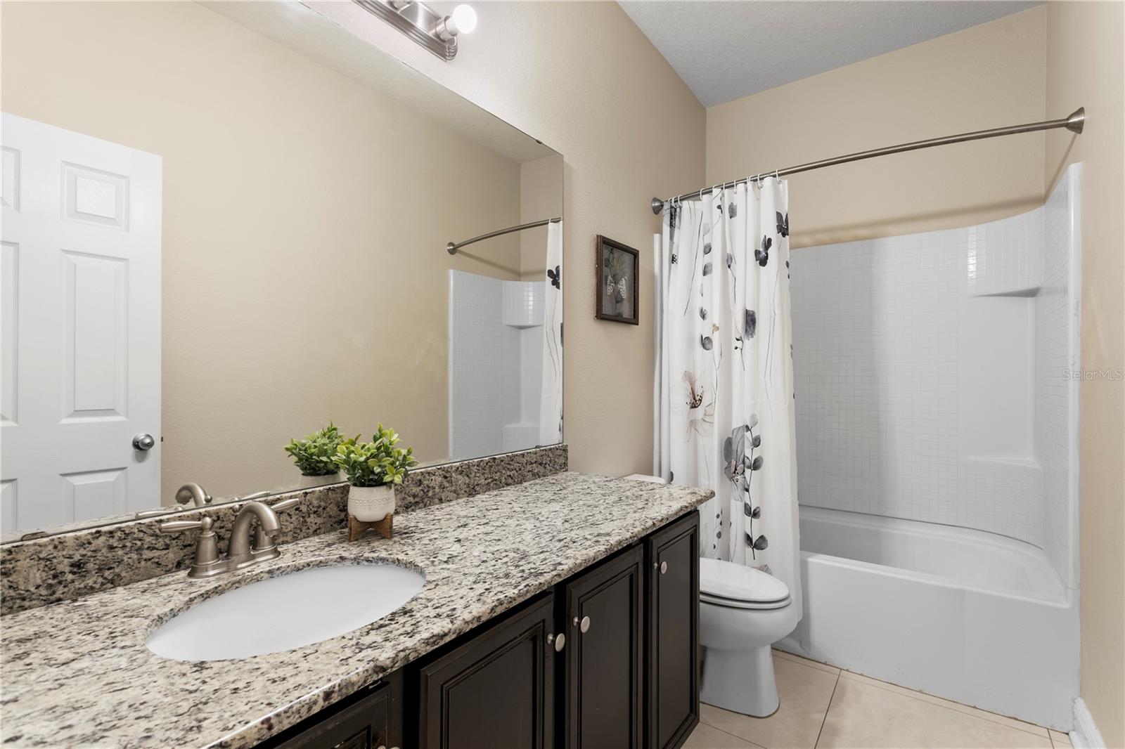 2nd full bath shared by 2nd and 3rd bedrooms