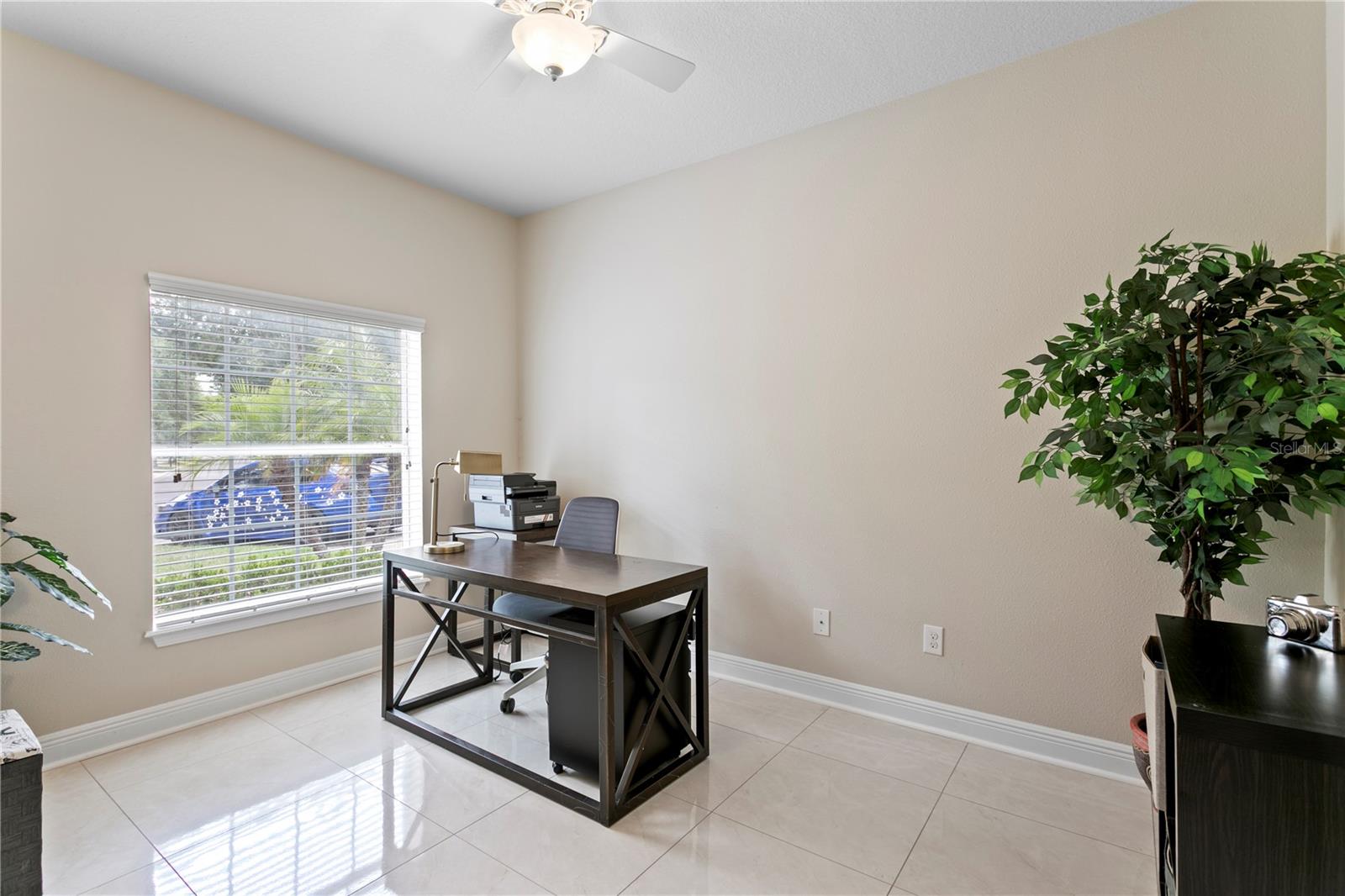 Office with glass-pane French doors