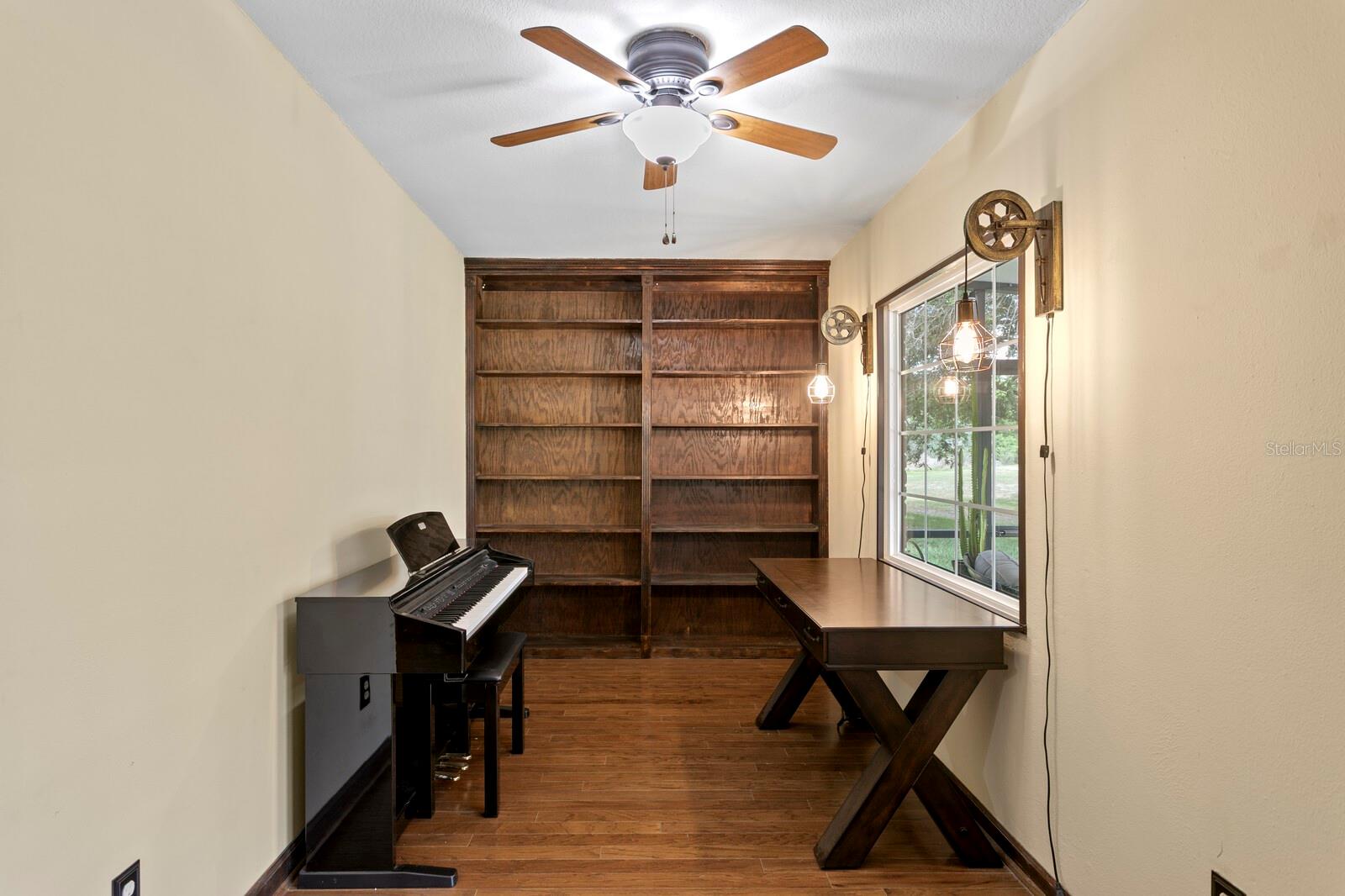 1st floor office w/built-in shelving unit