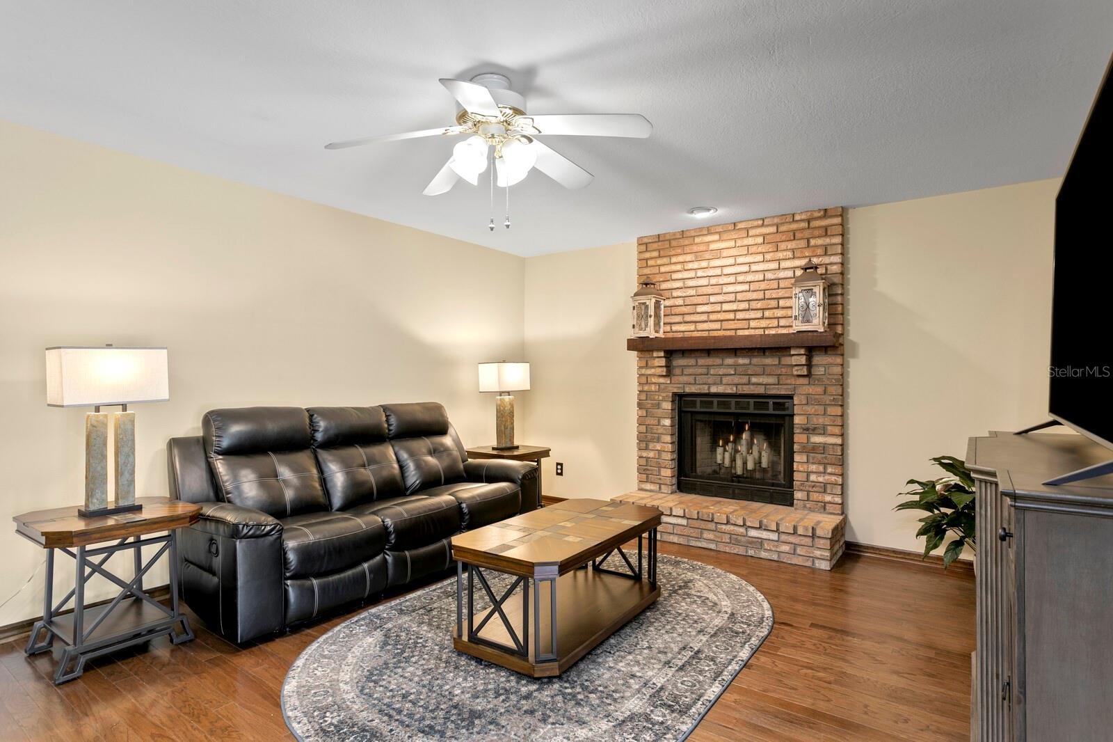 Wood burning fireplace in family room